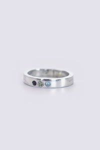thin band w/ topaz, ruby and cz