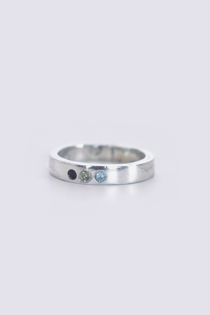 thin band w/ topaz, ruby and cz