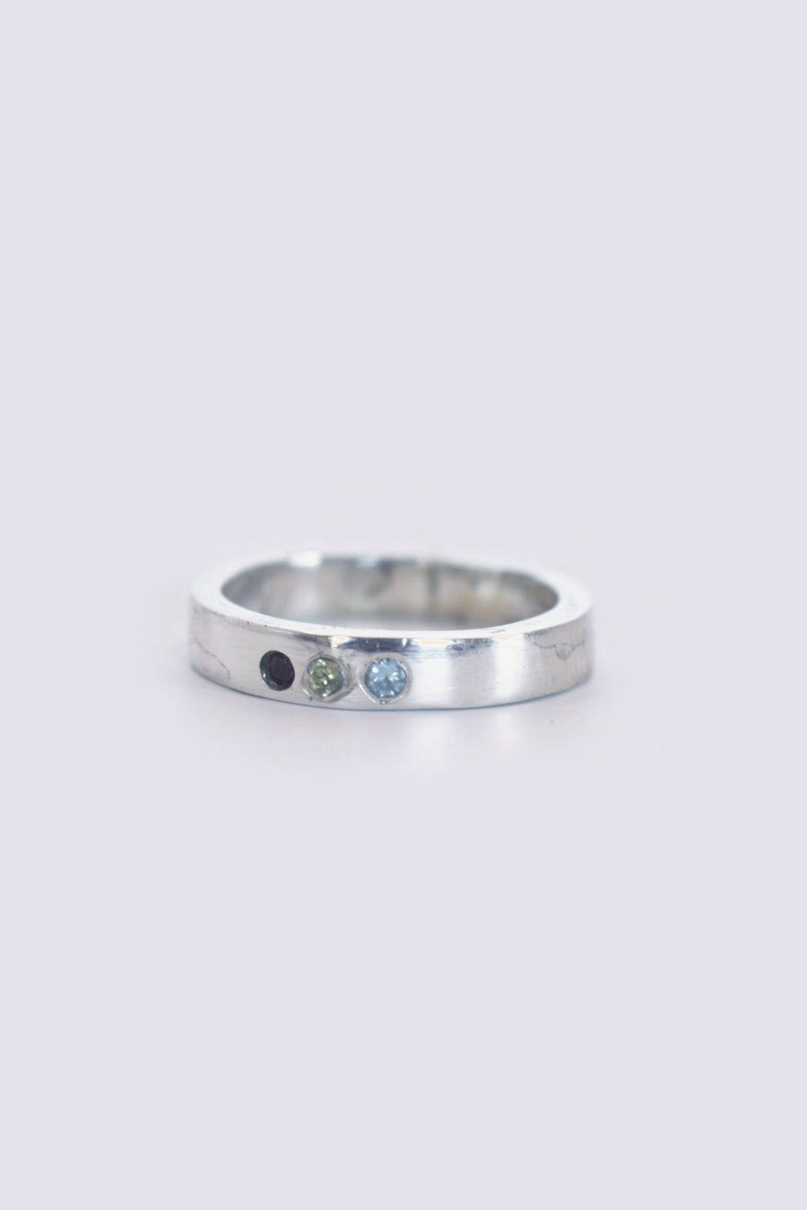 thin band w/ topaz, ruby and cz
